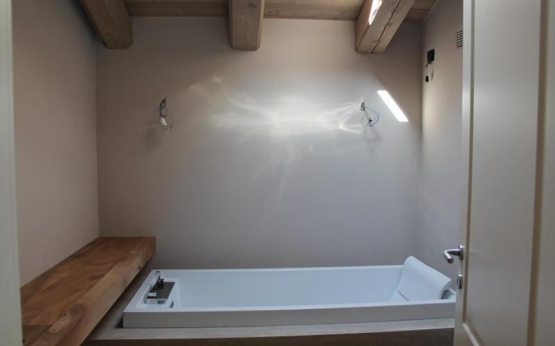 Attic bathroom with bathtub Verona province Vicenza