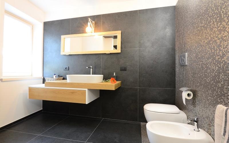 modern bathroom black mosaic tiles Verona
