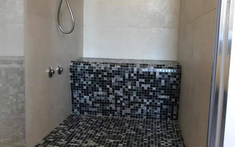 Shower tray and seat made of mosaic in a bathroom in Vicenza by pellizzari 