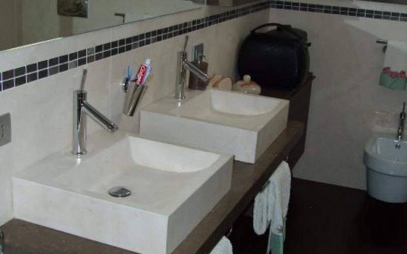 Marble washbasins in a bathroom in Arzignano, Vicenza