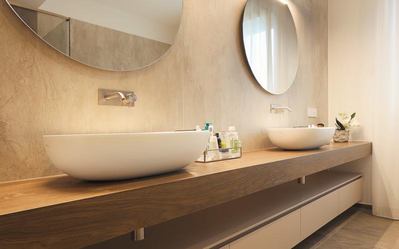 Wooden shelf and Corian basin for this bathroom unit in Vicenza