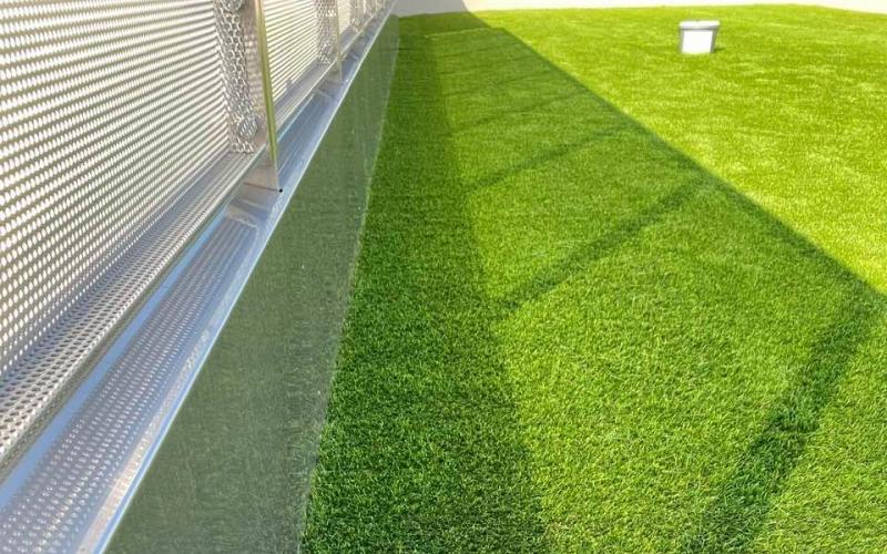 Synthetic grass on the roof of an industrial building