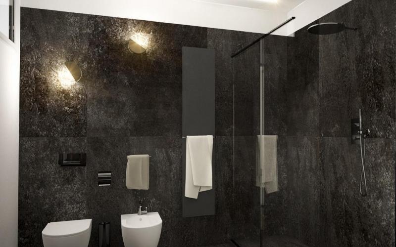 Bagno moderno ristrutturato con lavabo scuro pietra a Vicenza