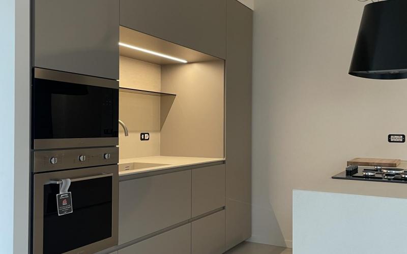 Modern light kitchen with island in Vicenza